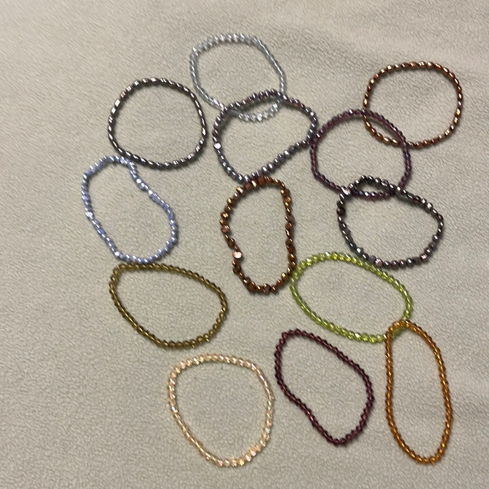 Set of 13 elastic beaded bracelets